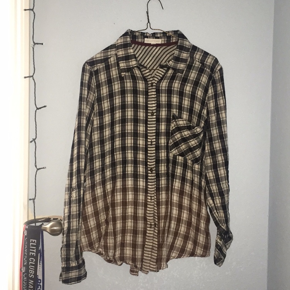 White and black with a little bit of tan flannel